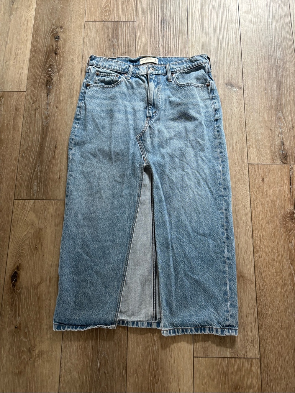 Abercrombie & Fitch light-wash denim maxi skirt featuring a classic front slit
